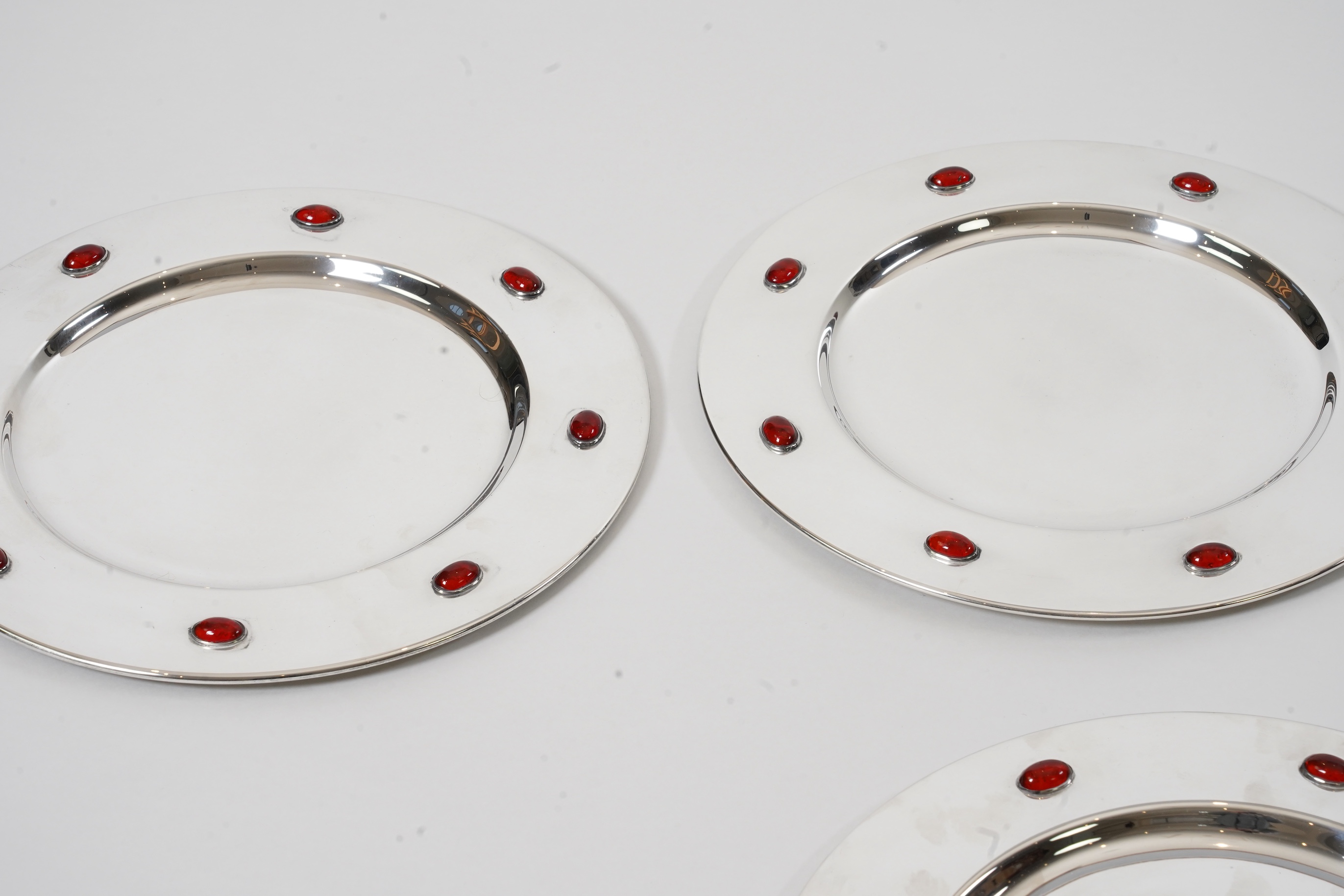 A set of six Glasgow School Arts & Crafts silver plated and cabochon glass set dinner plates